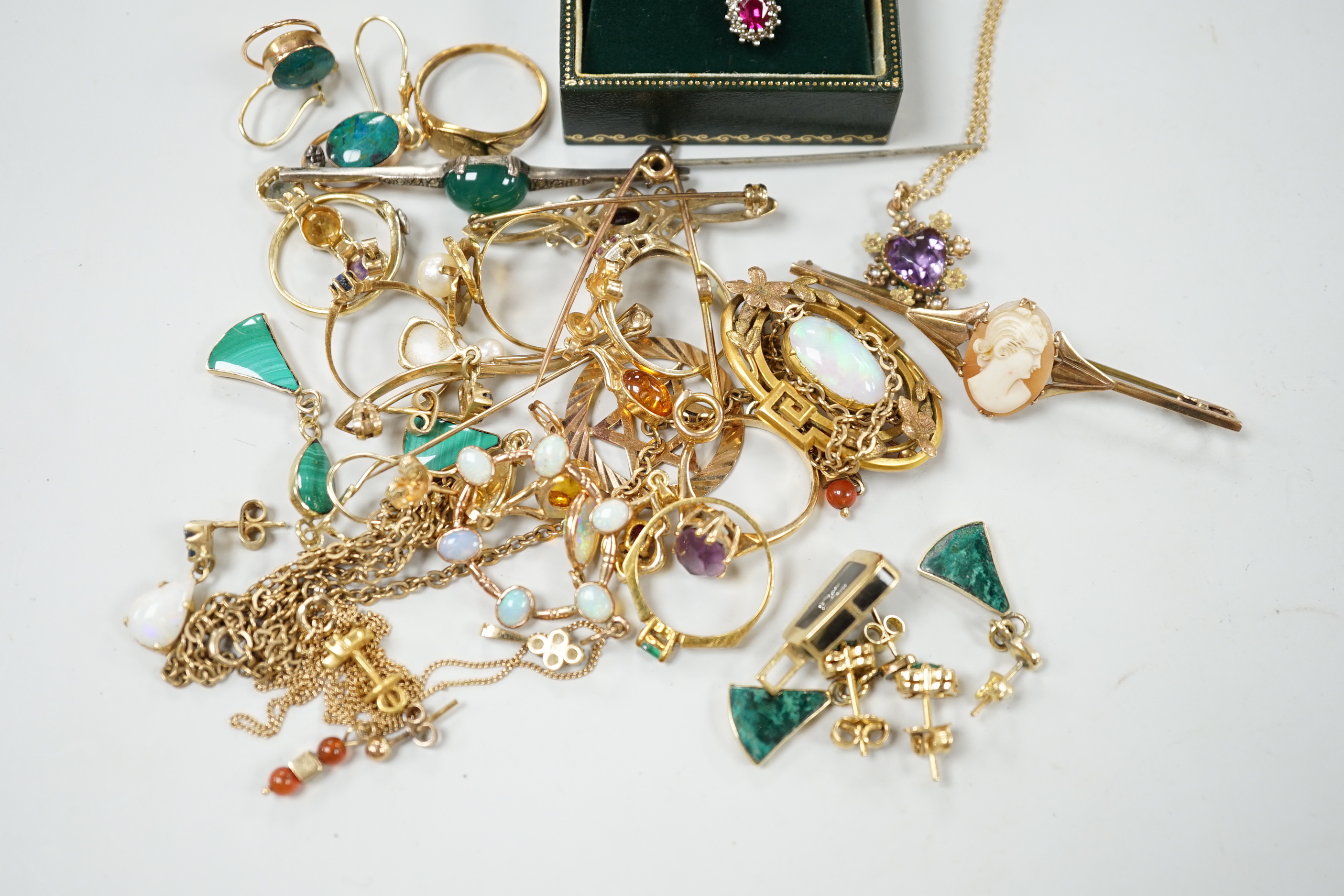 A group of assorted late Victorian and later jewellery including a 9ct gold, amethyst and seed pearl set heart shaped pendant necklace, a yellow metal and white opal cluster set pendant on a gold plated chain, a yellow m